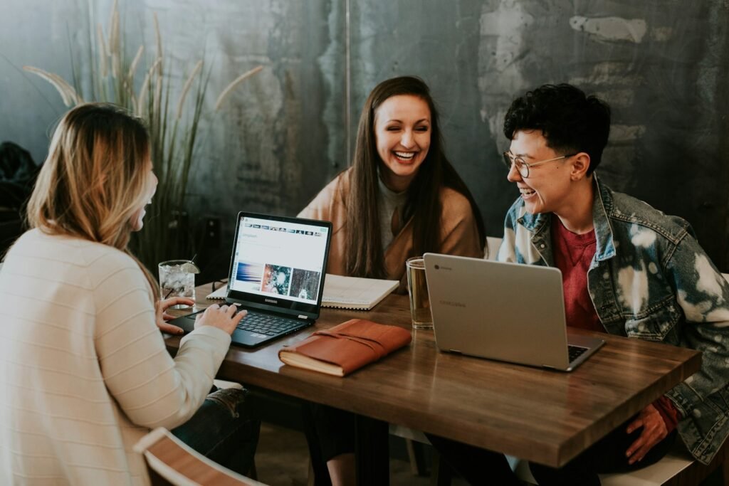 Small business owner meeting with a web design agency team